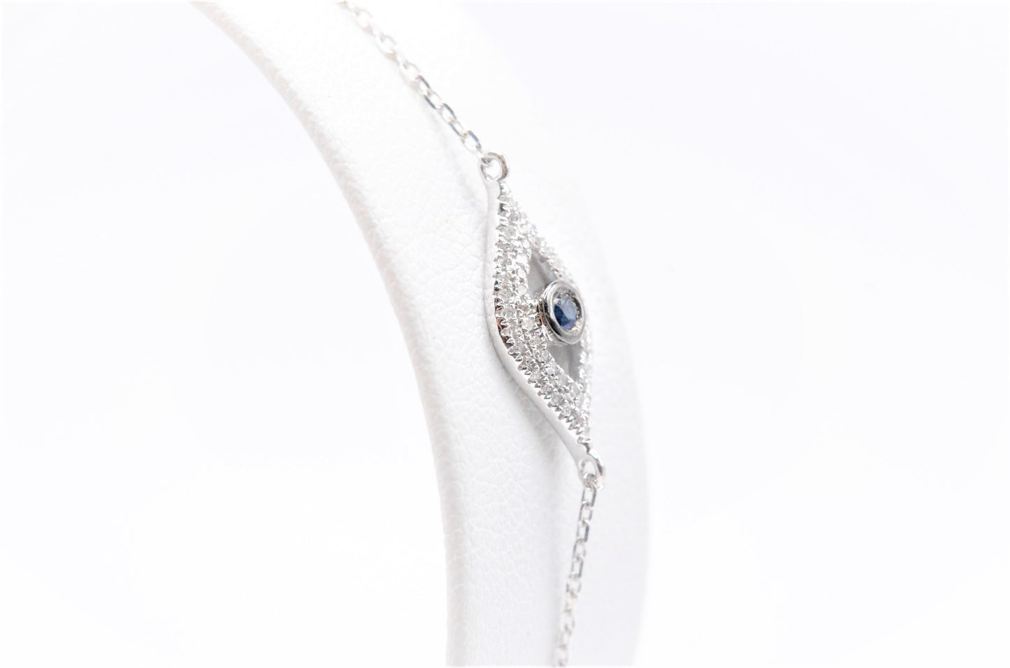 7.5" 0.15cttw. 1.3g Diamond and Sapphire 14k White Gold Evil Eye Bracelet