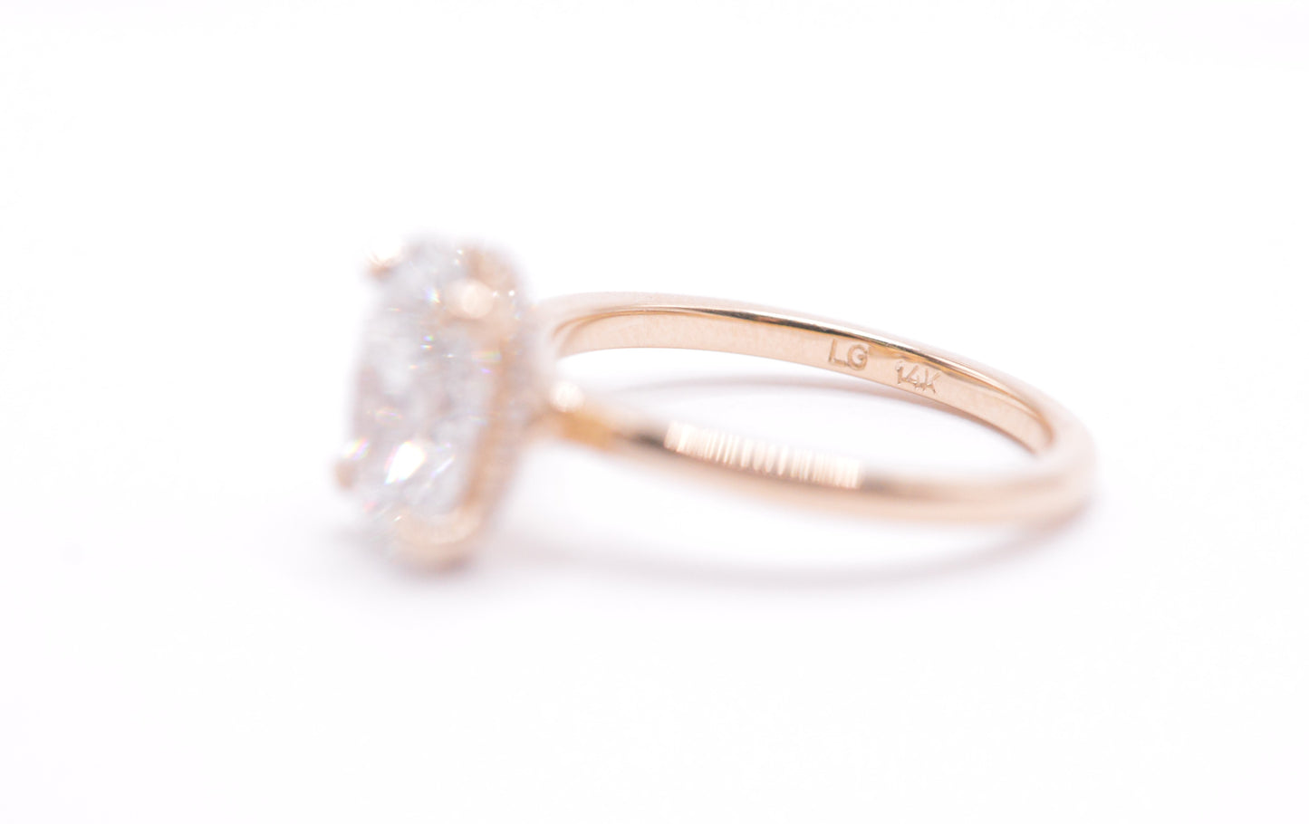 2ct oval lab diamond F color VS1 14k yellow gold solitaire with hidden halo