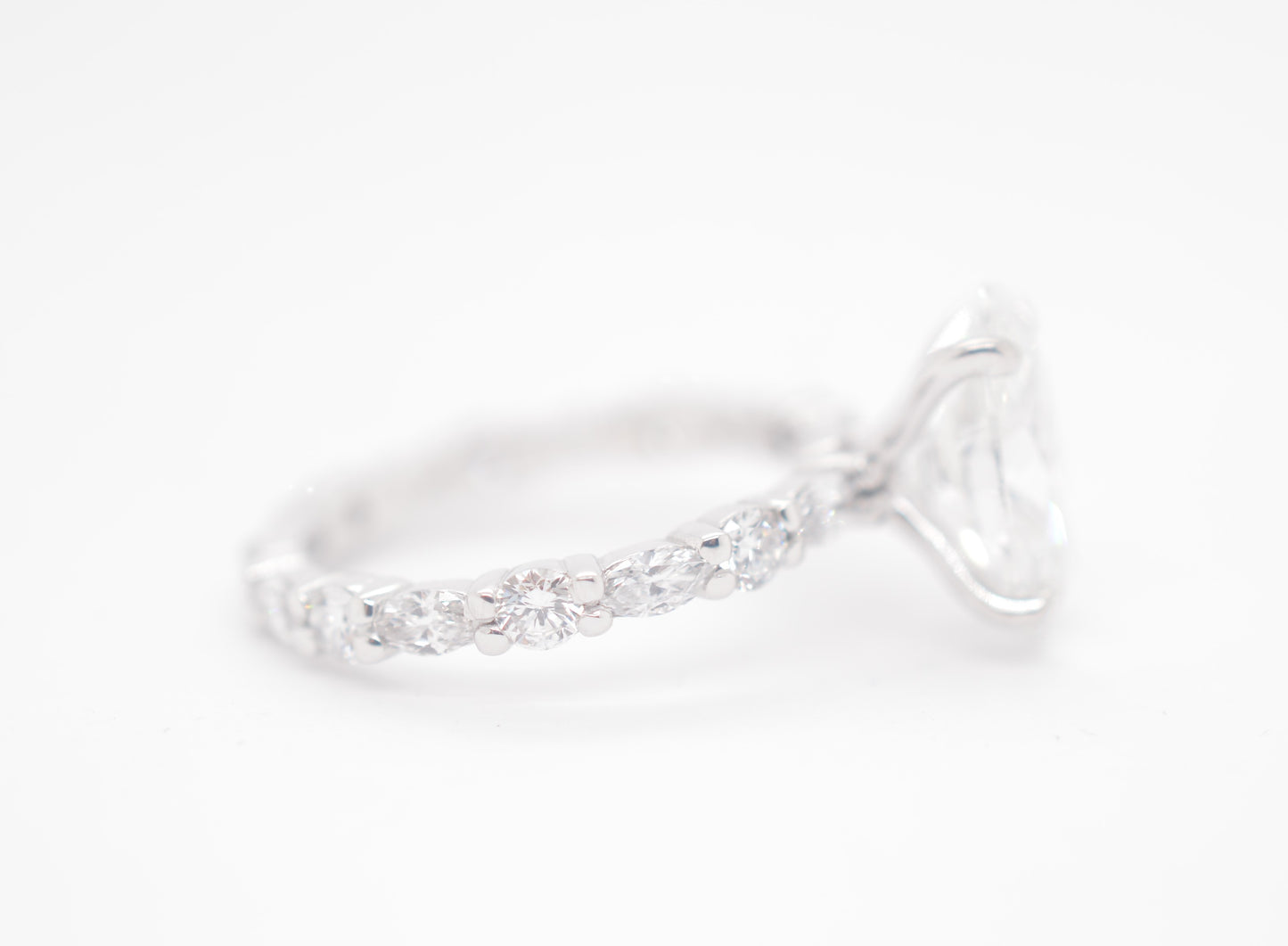 2.5ct Oval Lab diamond center IGI certified f color vs1 in custom marquis/round alternating eternity 14k white gold.