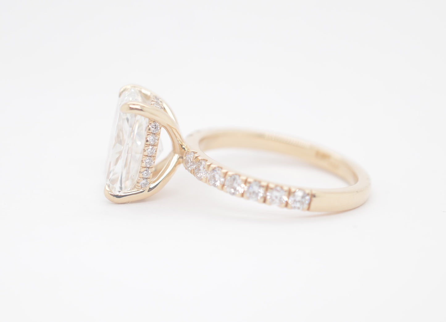 4ct cushion cut lab diamond igi certified diamond setting with accented under halo 14k yellow gold.