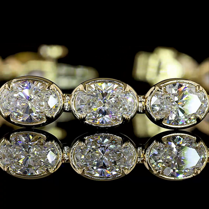 10.81 CTTW Oval Lab Diamond Tennis Bracelet (E Color and VS1 Clarity)