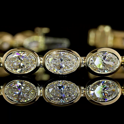 10.76 CTTW Oval Lab Diamond Tennis Bracelet (E Color and VS1 Clarity)