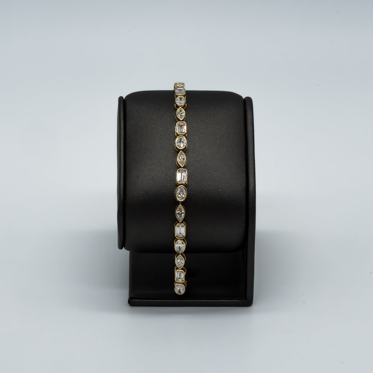 Live Sale Item # 62, 7" 7.29cttw d/e vvs mixed lab diamond bezel set tennis bracelet 14k yellow gold