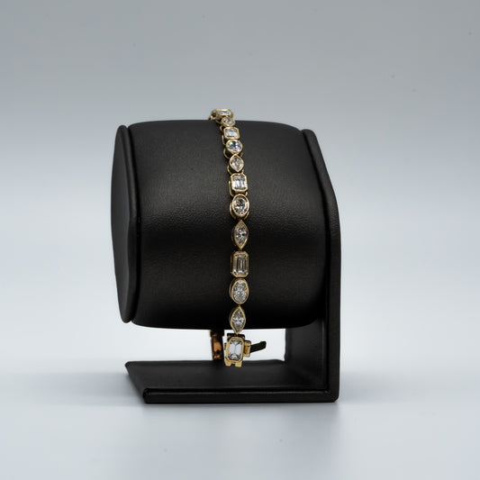 Live Sale Item # 62, 7" 7.29cttw d/e vvs mixed lab diamond bezel set tennis bracelet 14k yellow gold
