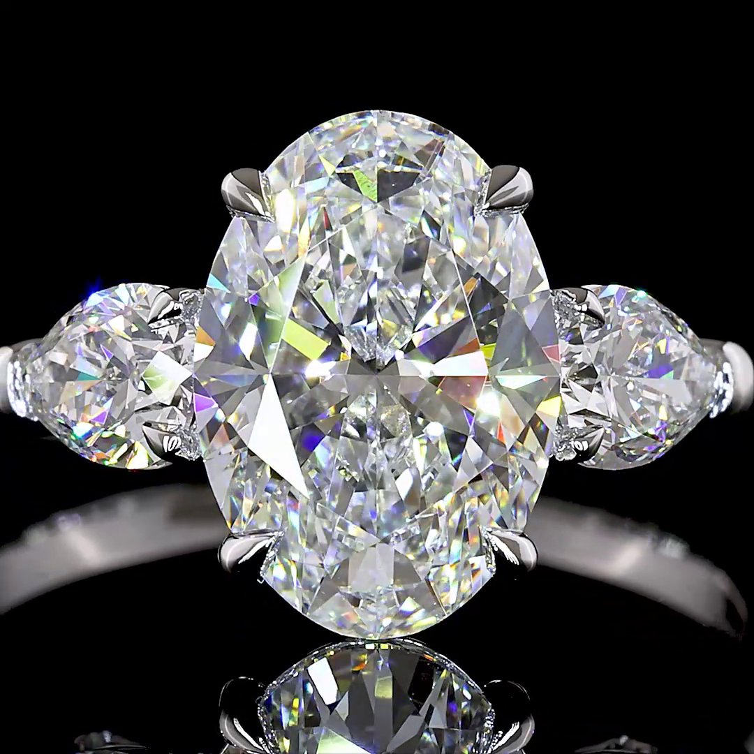 3.25 CTTW Oval Lab Grown Diamond 3 Stones Ring Sz. 7 (E Color and VVS2 Clarity)