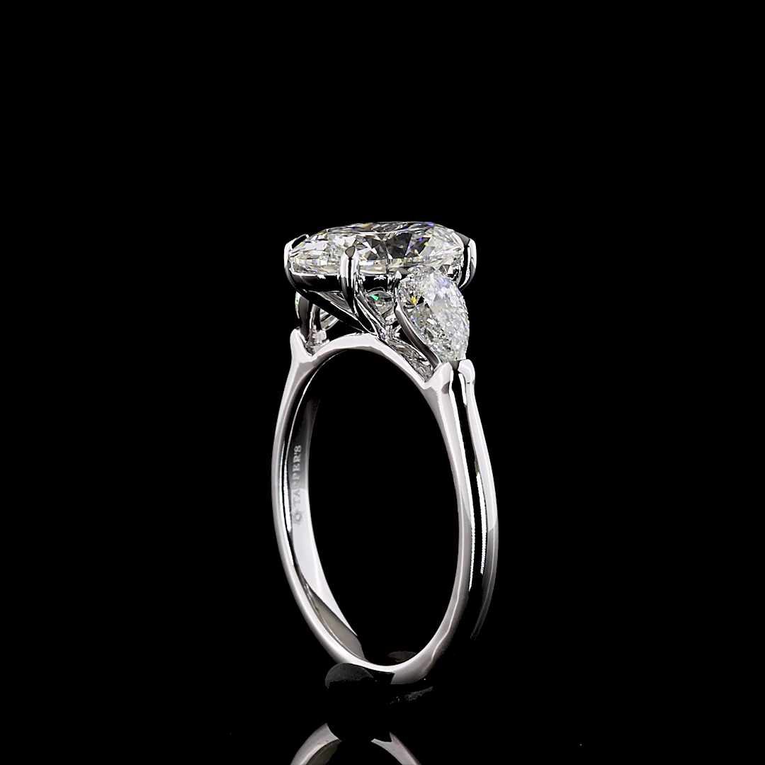 3.25 CTTW Oval Lab Grown Diamond 3 Stones Ring Sz. 7 (E Color and VVS2 Clarity)