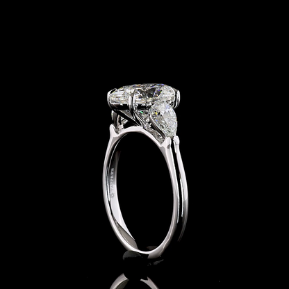 3.25 CTTW Oval Lab Grown Diamond 3 Stones Ring Sz. 7 (E Color and VVS2 Clarity)