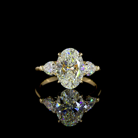 3.95 CTTW Oval Lab Grown Diamond 3 Stones Ring Sz. 7 (E Color and VVS2 Clarity)