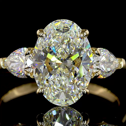 3.95 CTTW Oval Lab Grown Diamond 3 Stones Ring Sz. 7 (E Color and VVS2 Clarity)