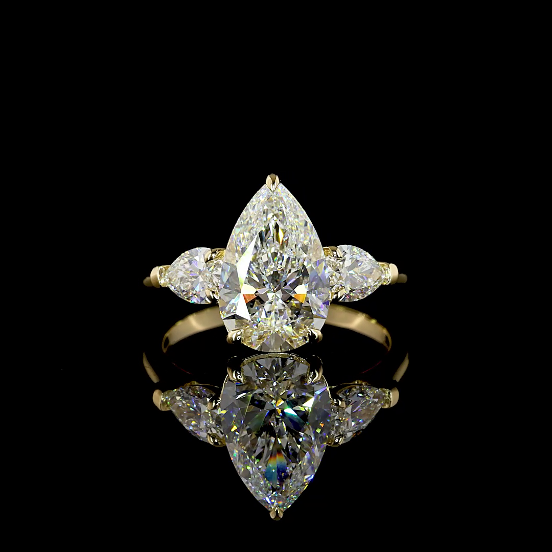 3.91 CTTW Pear Lab Grown Diamond 3 Stones Ring Sz. 7 (E Color and VVS2 Clarity)