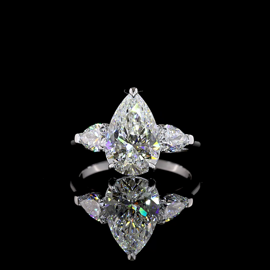 3.85 CTTW Pear Lab Grown Diamond 3 Stones Ring Sz. 7 (F Color and VS1 Clarity)