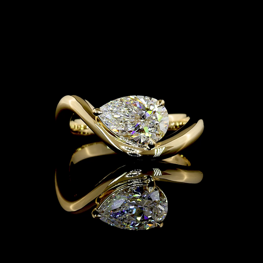 0.76 CT Pear Lab Grown Diamond Solitaire Ring Sz. 2.25 (E Color and VS1 Clarity)